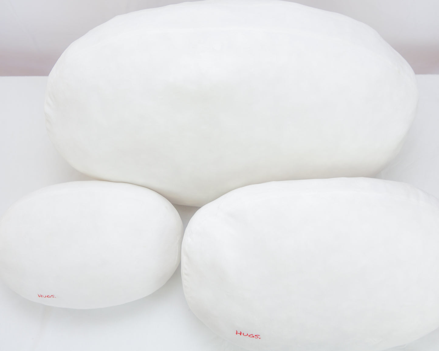 The Small/Travel Hugs Plush Pillow